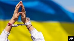 Кількість жертв сексуального насильства з боку російських військових в Україні зростає. AP Photo/Hannibal Hanschke