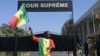 La Cour constitutionnelle a annulé le décret du président Sall qui, de facto, modifiait le calendrier électoral, trois semaines seulement avant l'échéance. (Photo by Seyllou / AFP)