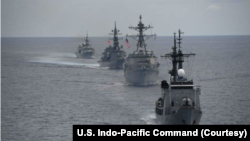 美国印太司令部2024年6月17日发布照片显示，美国、加拿大、日本和菲律宾在南中国海举行联合军演。