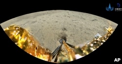This image released by China's National Space Administration shows a moon surface taken by a panoramic camera aboard the lander-ascender combination of Chang'e-6 spacecraft after it landed on the moon, Tuesday, June 4, 2024. (CNSA/Xinhua via AP)