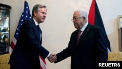 美国国务卿布林肯与巴勒斯坦民族权力机构主席马哈茂德·阿巴斯（Mahmoud Abbas）在约旦安曼举行会晤。（2023年10月13日）