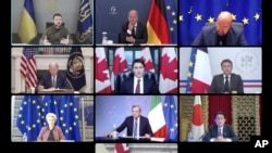 2022年10月11日，七大工业国组织领导人同乌克兰总统泽连斯基举行视频会议，乌克兰总统泽连斯基（左上角）与日本首相岸田文雄（右下角）同框出现在视频会议银幕上。