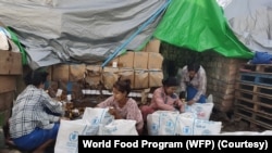 အမေရိကန် နိုင်ငံတကာဖွံ့ဖြိုးရေးအေဂျင်စီ (USAID) မှ လှုဒါန်းသည့် စားနပ်ရိက္ခာများ။ (ဓာတ်ပုံ၊ WFP) 