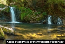 FILE - Kmyanets waterfall in the Skolivsky Beskydy National Park in the Carpathian Mountains. (Adobe Stock Photo by Ihorhvozdetskiy)