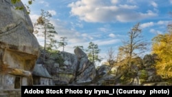 FILE - Dovbush rocks, a group of rocks, natural and man-made caves carved into stone. Photo taken on Oct. 22, 2020. (Adobe Stock Photo by Iryna_l)
