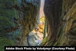 FILE - Split stone rock, inside view. Ternoshorskaya Lada. Dovbush Rocks. Carpathians, Kosiv district, Ivano-Frankivsk region, Ukraine (Adobe Stock Photo by Volodymyr)