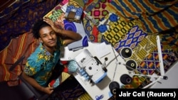 Esteban Sinisterra poses for a photograph at his studio in Cali, Colombia September 7, 2022. (REUTERS/Jair Coll)