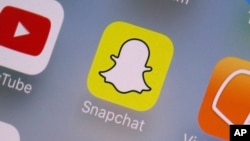 The Snapchat app is seen on a mobile device in New York, Aug. 9, 2017. (AP Photo/Richard Drew, File)