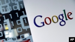 This March 23, 2010, file photo shows the Google logo at the Google headquarters in Brussels, Belgium. (AP Photo/Virginia Mayo, File)