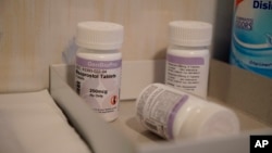 Bottles of the drug misoprostol sit on a table at the West Alabama Women's Center on Tuesday, March 15, 2022. (AP Photo/Allen G. Breed)