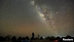 FILE - The Milky Way galaxy is seen in the night sky in the White Desert north of the Farafra Oasis southwest of Cairo May 16, 2015. (REUTERS/Amr Abdallah Dalsh/File)