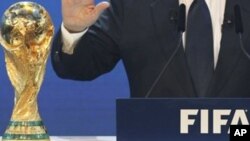 An African migrant reacts as he arrives at the CETI, the short-stay immigrant center, after crossing the border from Morocco to Spain&#39;s North African enclave of Ceuta, Spain.