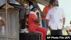 Детективи розслідують масове самогубство членів культу «Храм народів»