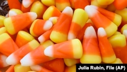 FILE - This image shows a pile of candy corn in Westchester County, N.Y., Oct. 23, 2023. 