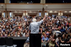 Senator Bernie Sander waves farewell to his electoral delegates gathered at the Convention Center during the Democratic National Convention in Philadelphia, July 25, 2016. REUTERS/Bryan Woolston