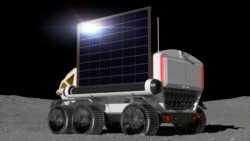 This graphic illustration provided by Toyota Motor Corp. shows a vehicle called "Lunar Cruiser" to explore the lunar surface. (Toyota Motor Corp. via AP)