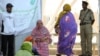 Des femmes attendant de voter à Nouakchott, lors de la présidentielle mauritanienne, le 21 juin 2014.