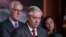 Sen. Lindsey Graham, R-S.C., flanked by Sen. John Cornyn, R-Texas, left, and Sen. Katie Britt, R-Ala., speaks to reporters as they criticize President Joe Biden's policies on the US-Mexico border, at the Capitol in Washington, Thursday, Dec. 7, 2023.
