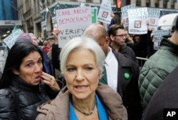 Jill Stein, the presidential Green Party candidate, arrives for a news conference in front of Trump Tower, Dec. 5, 2016, in New York.