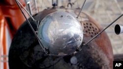 A test version of the Sputnik satellite on display at a museum in Seattle. The small satellite took the world into the Space Age.