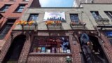 Memorial outside The Stonewall Inn, considered by many the center of New York's gay rights movement, following Pulse Orlando massacre, Manhattan, June 12, 2016.