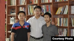 Beijing Lawyer Zhang Kai, Wu Liangjie (L) and Deng Jiyuan (R)