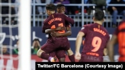 Couthino et Dembélé du FC Barcelone après un but lors du match contre Malaga, au stade La Rosaleda, Espagne, 10 mars 2018. (Twitter/FC Barcelone)
