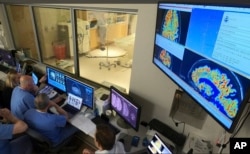 Scientists have found a way to help Alzheimer’s drugs seep inside the brain faster - by temporarily breaching its protective shield. (Victor Finomore/WVU Rockefeller Neuroscience Institute via AP)