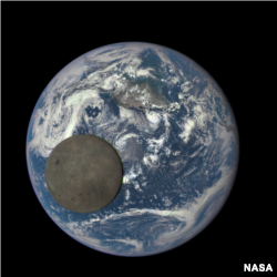 This image shows the far side of the moon, illuminated by the sun, as it crosses between the DSCOVR spacecraft's Earth Polychromatic Imaging Camera (EPIC) camera and telescope, and the Earth - one million miles away. (Credits: NASA/NOAA)