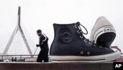 Here, a sculpture of the classic "Chuck Taylor" (Chuck T) sneakers are outside the world headquarters of Converse, Inc. in Boston (Dec. 29, 2016.)
