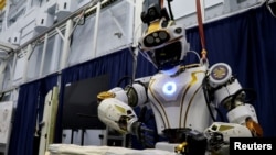 NASA's humanoid robot Valkyrie opens a bag at the Johnson Space Center in Houston, Texas, U.S., November 16, 2023. (REUTERS/Evan Garcia)