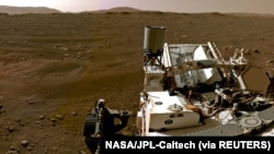 A portion of a panorama made up of individual images taken by the Navigation Cameras, or Navcams, aboard NASA's Perseverance Mars rover shows the Martian landscape, Feb. 20, 2021. (NASA/JPL-Caltech/Handout via Reuters)