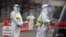 During the coronavirus pandemic, many resources were spread very thin. Pictured here, medical workers screen people arriving at a special COVID-19 testing site in Boston, Saturday, March 28, 2020. (AP Photo/Michael Dwyer)
