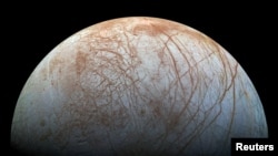FILE - A view of Jupiter's moon Europa created from images taken by NASA's Galileo spacecraft in the late 1990's, according to NASA, obtained by Reuters May 14, 2018. (NASA/JPL-Caltech)