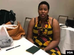 Looking for a passport ... One of the people who managed to get a passport at this year's Zim Expo in Chicago.