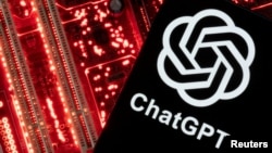 FILE - A smartphone with a displayed ChatGPT logo is placed on a computer motherboard in this illustration taken February 23, 2023. (REUTERS/Dado Ruvic/Illustration/File Photo)