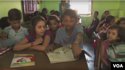 Indian students taking classes at an education center