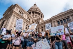 FILE - In this Oct. 2, 2021, photo, protesters take part in the Women's March and Rally for Abortion Justice at the State Capitol in Austin, Texas.