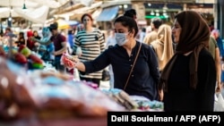 Le marché de la ville à majorité kurde de Qamishli dans la province de Hasakeh, dans le nord-est de la Syrie, le 19 mai 2020 à quelques jours de l'Aïd al-Fitr.