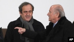 Michel Platini et Sepp Blatter, 16 decembre 2014. (AP Photo/Christophe Ena, file)