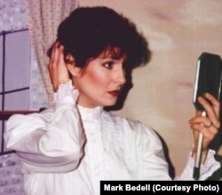 Della looking at her short hair. From a production of The Gift of the Magi, dramatized by Mark Bedell. (Courtesy of Mark Bedell)