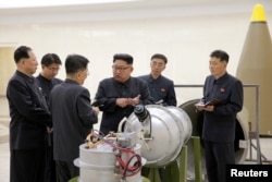 FILE - North Korean leader Kim Jong Un provides guidance on a nuclear weapons program in this undated photo released by North Korea's Korean Central News Agency (KCNA) in Pyongyang, Sept. 3, 2017.