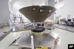 NASA's Mars bound "InSight" lander undergoes its final check outs and processing before encapsulation and mating to a ULA Atlas V rocket.