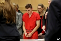Nikolas Cruz appears in court for a hearing in Fort Lauderdale, Fla., Monday, Feb. 19, 2018.