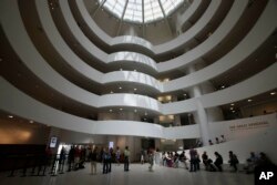 This May 31, 2011, file photo, shows the interior of the Solomon R. Guggenheim Museum, architect Frank Lloyd Wright and built from 1956-1959, in New York. (AP Photo/Kathy Willens, File)