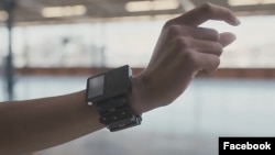 This file photo shows a research prototype model of a wristband device developed by Facebook to be used with its augmented reality glasses. (Photo Credit: Facebook)