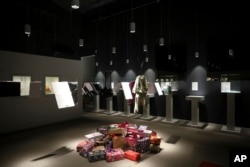 Holiday presents for children on display in Ukraine prepared by Bosnian children at the War Childhood Museum in Sarajevo, Bosnia, Saturday, Dec. 17, 2022. (AP Photo/Armin Durgut)