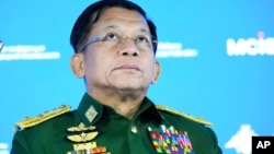 မှတ်တမ်းပုံဟောင်း_ဗိုလ်ချုပ်မှူးကြီး မင်းအောင်လှိုင် June 23, 2021 (AP Photo/ Alexander Zemlianichenko, Pool)