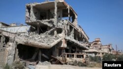 Des immeubles endommagés par des bombardements à Benghazi, Libye, 4 avril 2016.