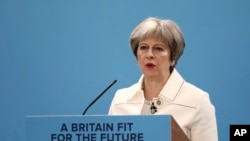 La Première ministre britannique, Theresa May, lors du Forum du printemps du Parti conservateur au centre de Londres, le 17 mars 2018.
